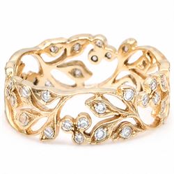 18ct rose gold diamond floral band, milgrain and pierced set with round cut diamonds, stamped 750