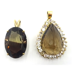  Gold smoky quartz pear shaped cluster dress pendant stamped 18kt and a similar pendant hallmarked 9ct, length 4cm dim.  