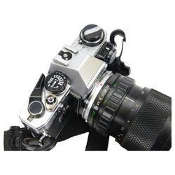 Olympus OM10 camera body serial no. 2279129, together with an Olympus OM-System S Zuiko Auto-Zoom 35-70mm 1:4 lens serial no. 283352, a Paragon 1:5.6 f=300mm 62 lens serial no. 12053, Hoya HMC Tele-Auto f-135mm 1:2.8 52 lens serial no. 638199, Tokina SD 70-210mm 1:4-5.6 52 serial no. 8844630, Olympus OM winder 2, Colly miniature/spy camera and other accessories in a Fotima carry case