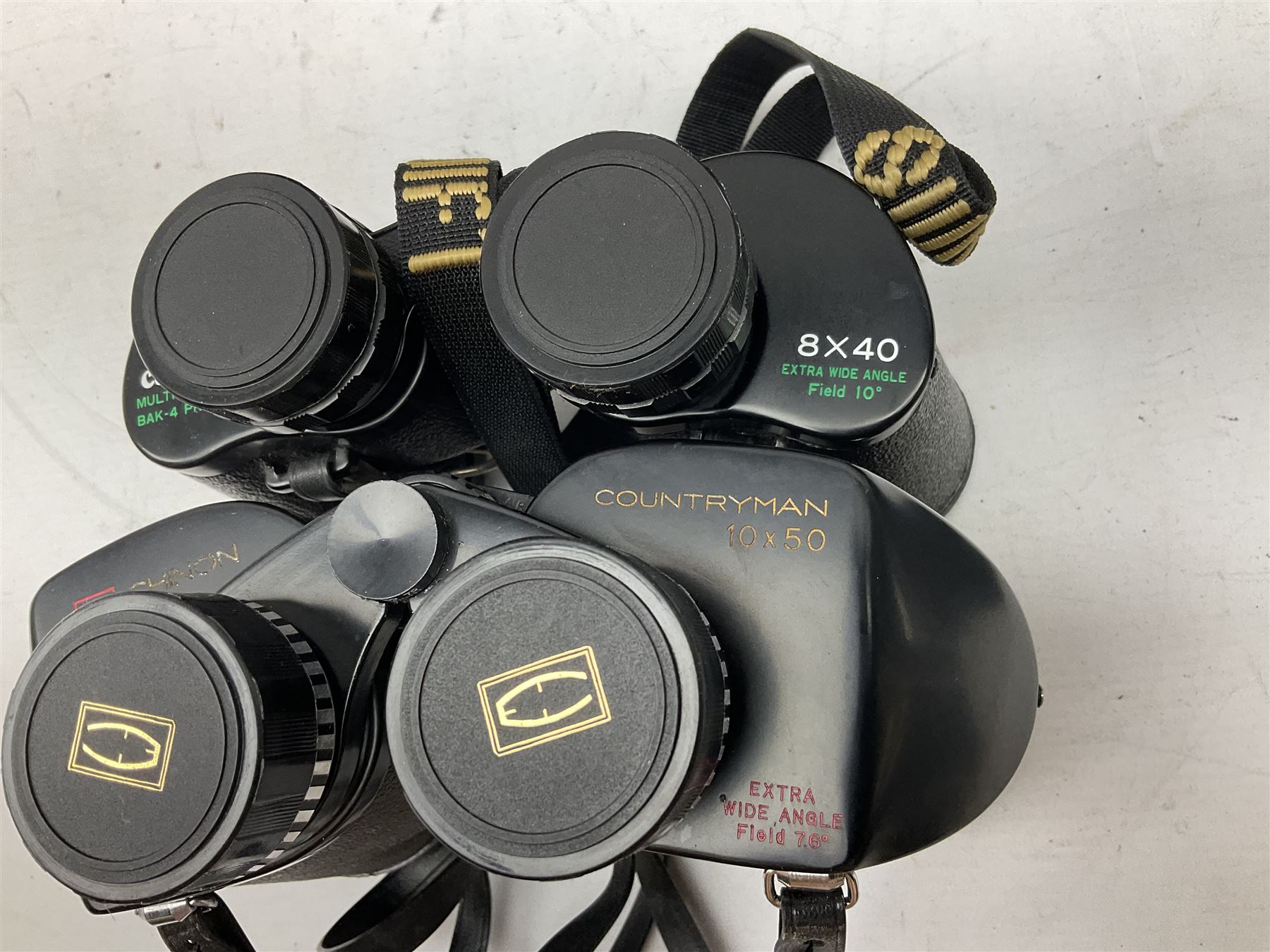 Eleven cased pairs of binoculars to include Summit 8x30,  Concord 8x40, Tasco no. 106 8x - 16x40, Chinon 10x50, Tokina 7x42 Field, Zoom 6x- 12x32 etc