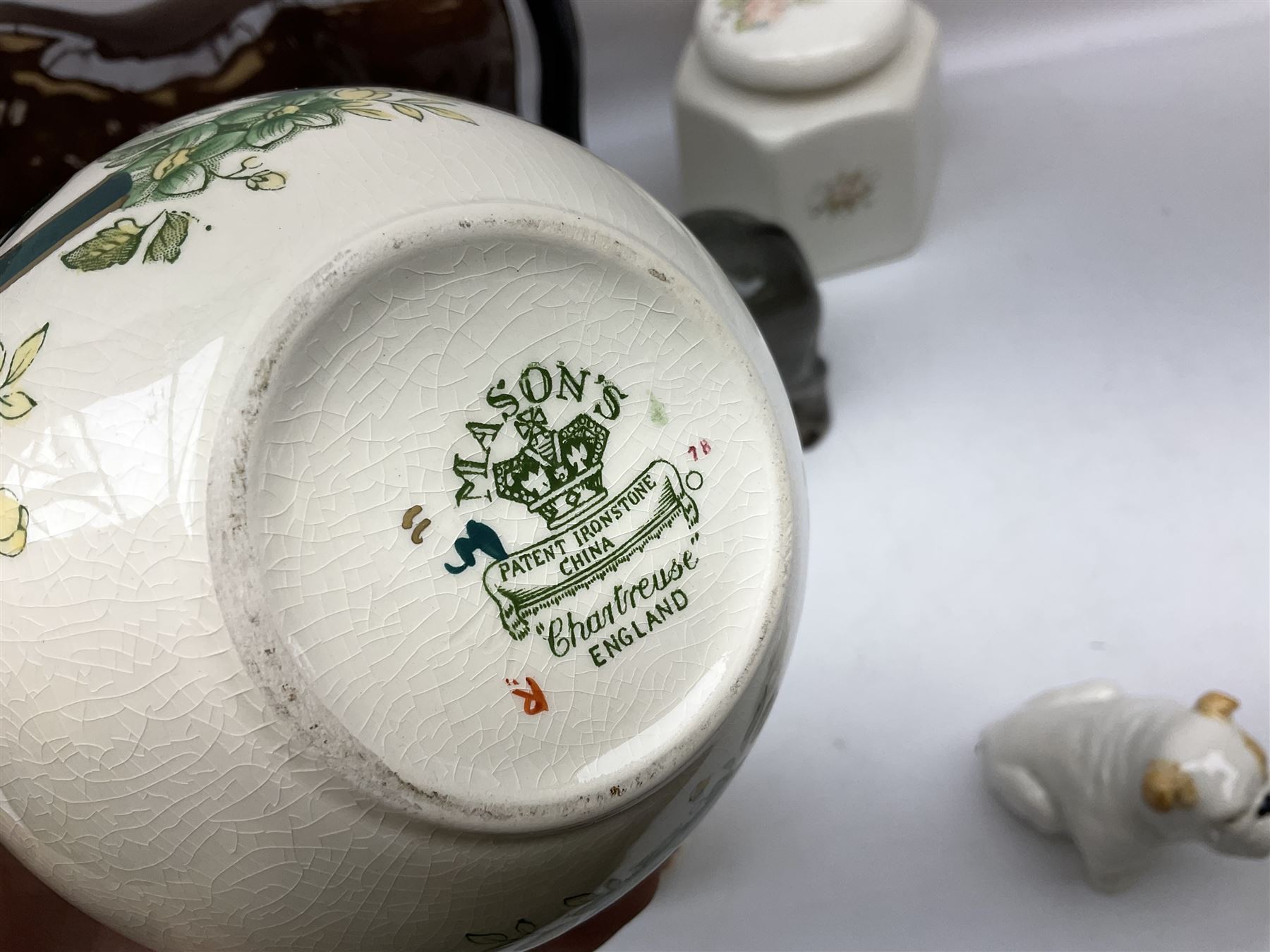 Beswick model of a seated bulldog, model no. 1872, Beswick Laurel & Hardy cruet set on stand, no. 575, Melba Ware animal figures to include large horse, hippo, rhino, USSR tiger cub figure, other ceramics to include Mason's lidded jar etc