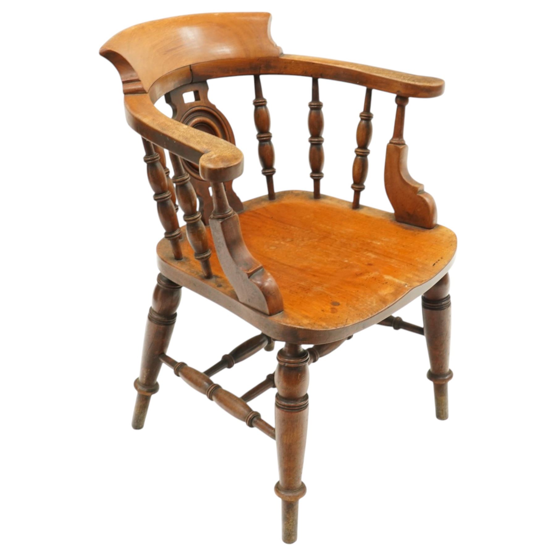 Victorian mahogany Captains chair, central roundel splat flanked by turned spindles, on turned supports united by double H-stretcher