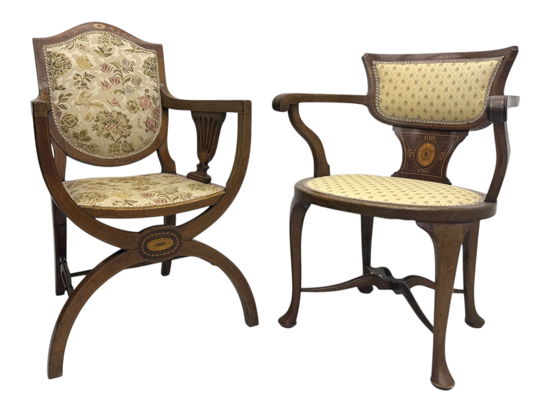 Edwardian inlaid mahogany X-frame armchair, upholstered seat and shield-back, curved front supports united by turned H-stretcher (W57cm, D58cm, H94cm); similar inlaid mahogany armchair, raised on cabriole supports united by cross-stretcher (W62cm, D60cm, H82cm) 