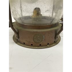 Ship's copper and brass Anchor mounted lantern with caged clear glass lens, by Seahorse, together with a smaller light with carrying handle in grey finish