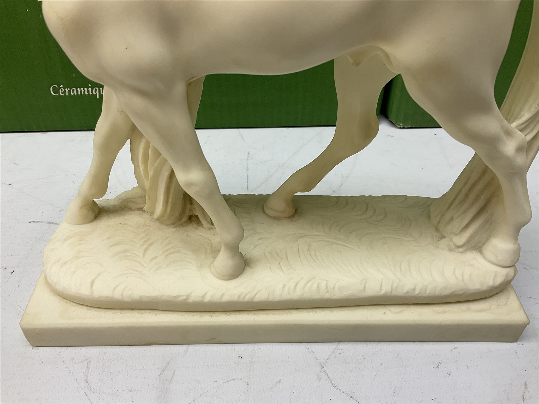 Five Beswick and Royal Doulton horse figures in matt white on black plinths, comprising of  Spirit of Affection no. 2689/2536, Springtime no.2837, Spirit of peace no.2916, Spirit of earth no.2914 and Spirit of the wild no. 183, together with a composite figure of a horse (6)