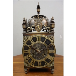  Early 20th century lantern style mantel clock, twin train movement striking the hours and half on bell, recently serviced 27/2/18 (with receipt), H39cm  