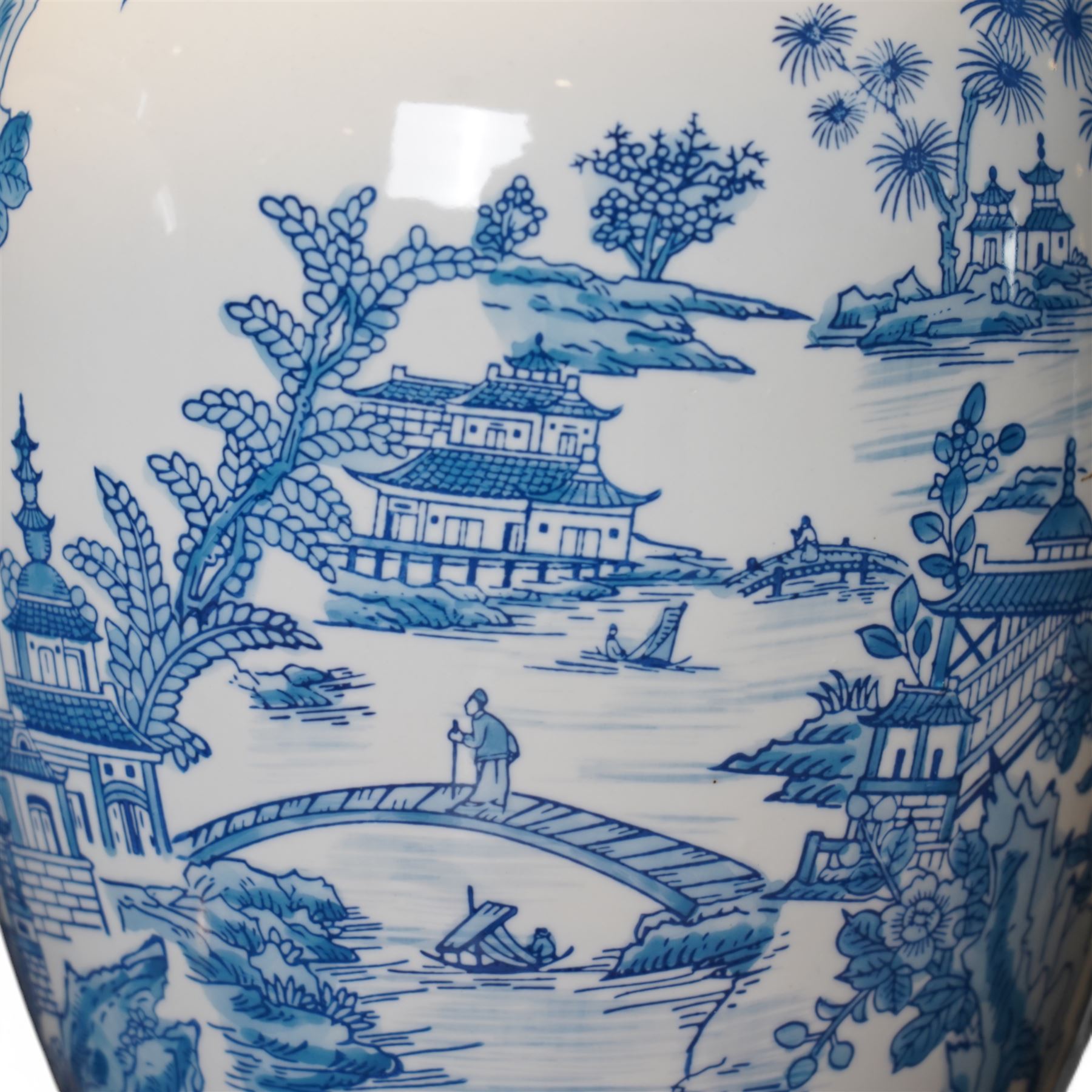 Pair of lamps of baluster form, decorated with a Japanese landscape on a white ground raised upon a gilt footed base, H60cm including shades 