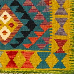 Maimana kilim flatweave runner, central field features a large bold nested diamond motif and stylized geometric lozenge patterns on olive purple, blue, and green tone ground, border stripe in teal ground, and fringe