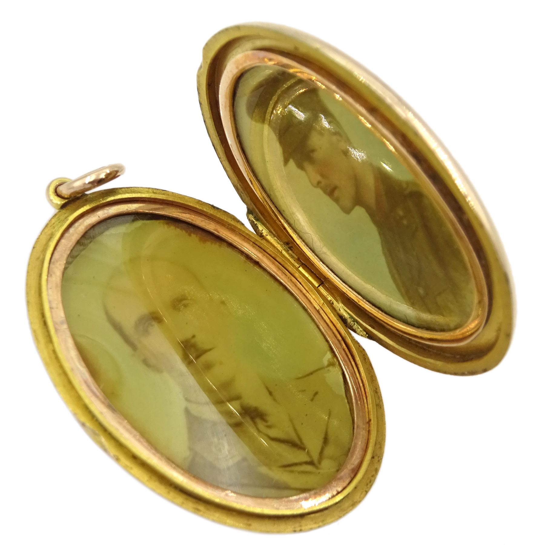 WW1 9ct rose gold hinged locket pendant with Royal Flying Corps and Royal Engineers engraved insignia, with officer photographic portraits within, by Cornelius Desormeaux Saunders & James Francis Hollings (Frank) Shepherd, London 1917

Provenance: From the late professor Derek Colville Scarborough