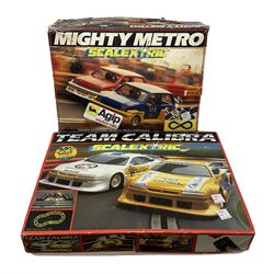 Two boxed Scalextric sets, Team Calibra and Mighty Metro 