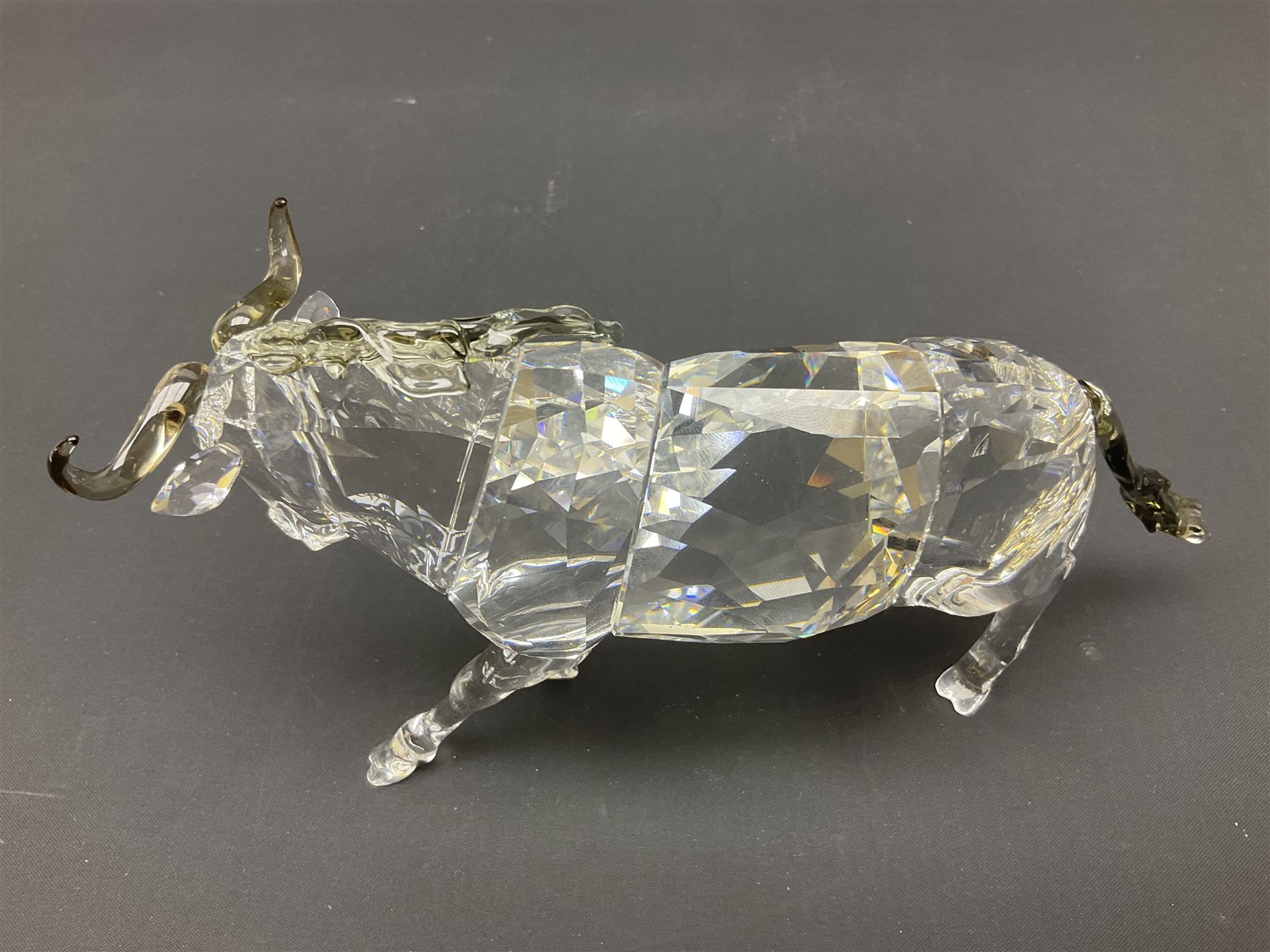 Swarovski Crsytal Society coloured animals, comprising zebra, giraffe and water buffalo, tallest H17.5cm