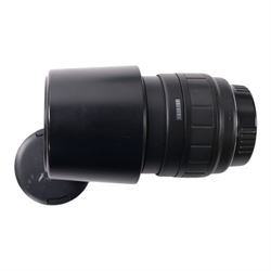 Eight camera lenses, comprising Canon Ultrasonic Zoom EF 75-300mm 1:4-5.6 lens, AF Nikkor 35-70mm 1:3.3-4.5 lens, Nikkor 60-180mm 1:4.5-5.6 lens, Canon Zoom EF 28-80mm 1:3.5-5.6 lens, Canon Zoom EF 80-200mm 1:4.5-5.6 lens, Sigma 70-300mm 1:4.6-5.6 DL Macro, Sigma Zoom 70-210mm 1:4-5.6 UCII lens and a Sigma AF 70-300mm 1:4-5.6 APO Macro lens, all with lens caps