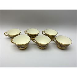 Royal Worcester tea service for six, hand painted with fruits and heightened with gilt, signed J Smith, comprising teapot, teacups, saucers, side plates, sucrier, milk jug and plate, each with black printed mark beneath 