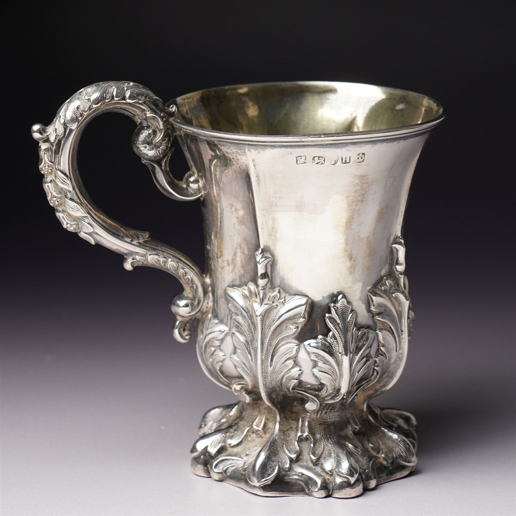 Victorian silver cup with acanthus leaf decoration and scroll handle, H12cm with retailers mark of J Mayer, Liverpool Sheffield 1851Maker Henry Wilkinson & Co