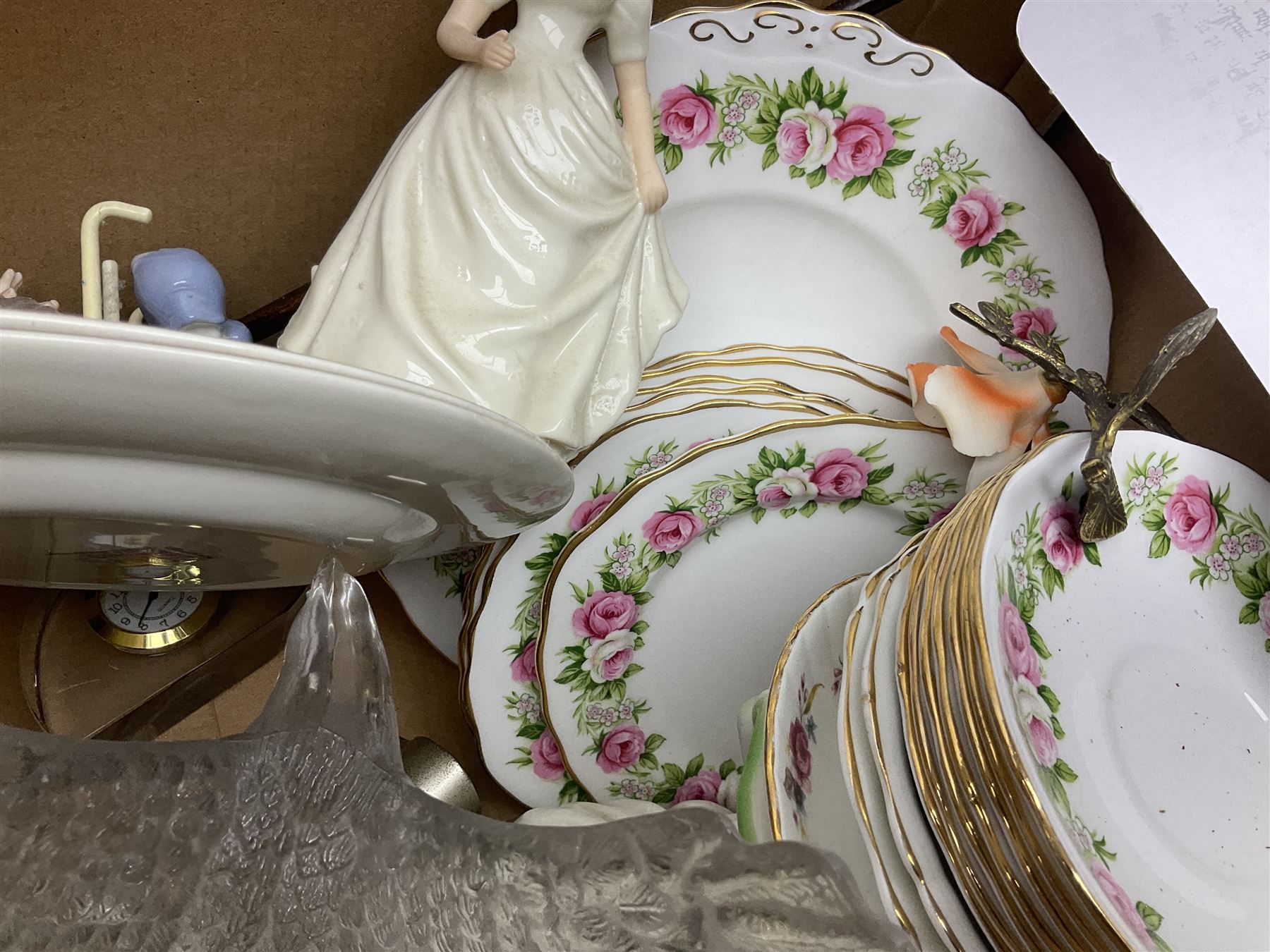 Dolls of the world, together with glass decanters, tea wares and other collectables, in two boxes 