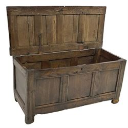 18th century oak blanket box, four panel hinged lid over triple panelled front, moulded frame, on stile supports 