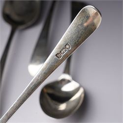 Set of six George III silver dessert spoons with bright cut stems and engraved with a crest London 1783 Maker Hester Bateman