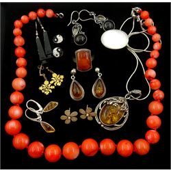 Two pairs of silver Baltic amber pendant earrings, silver amber pendant necklace and ring, silver and silver stone set earrings and ring and a pink bead necklace