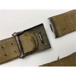 Pair of WW2 German Other Ranks trousers c1940-42, stamped C.& A. Brenninkmeyer Workstatten; WW2 German Army webbing belt with steel 'Gott Mit Uns' buckle; and WW2 German leather belt with 'Stahlhelm' (Steel Helmet League) members buckle (3)