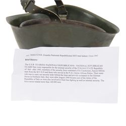Italian G.N.R. (Guardia Nazionale Repubblicana) M33 helmet, circa 1943
The G.N.R were responsible for the internal security of the Italian State repubblic of Salo, after 1943 members of the security force consisted of ex carabinieri, fascist militaria men from the M.V.S.N and those who served in the P.A.I Italian African Police. 
