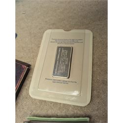 The Birmingham Mint International Formula 3 silver ingot, hallmarked, pair of sovereign scales, two silver fobs and others, etc and a collection of Great British coins