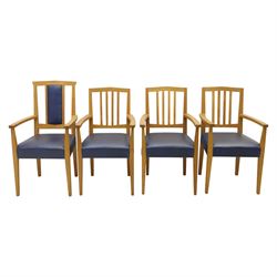 Modern twelve oak dining chairs including one 'Chairmans' chair, solid oak construction, slatted back and arm rests, blue leatherette padded seat, on tapered square supports 