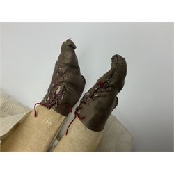 Victorian wax shoulder head doll with pale complexion, applied hair, inset glass eyes and fabric covered jointed body with kid leather lower arms; white linen dress and undergarments H50cm