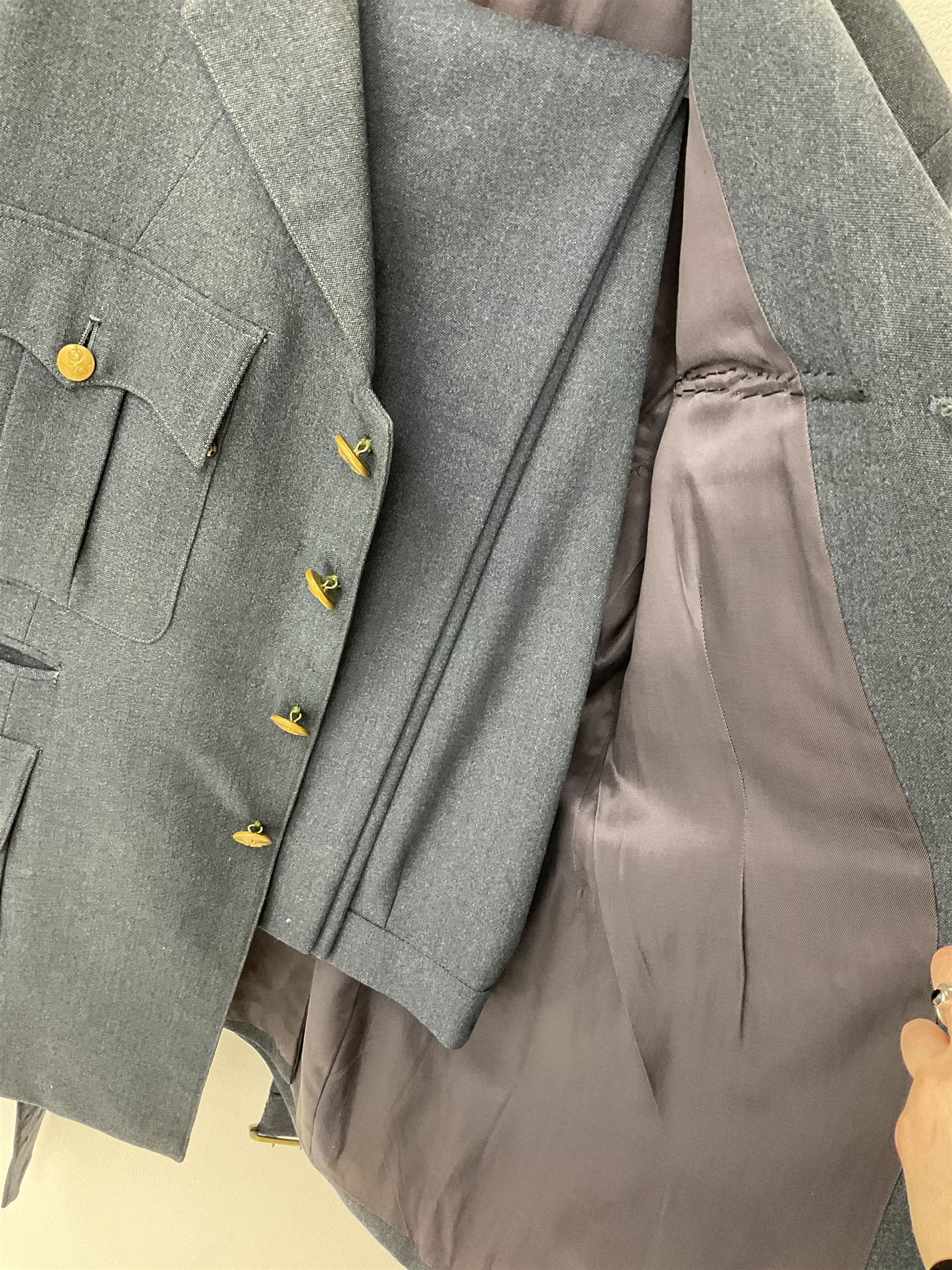 RAF Flight Lieutenant's uniform with peaked cap and WW2 ribbon bar; WW2 gas mask in blue canvas bag dated 1942; flying helmet date 1984; and British Army Major's uniform with Staybrite buttons and peaked cap