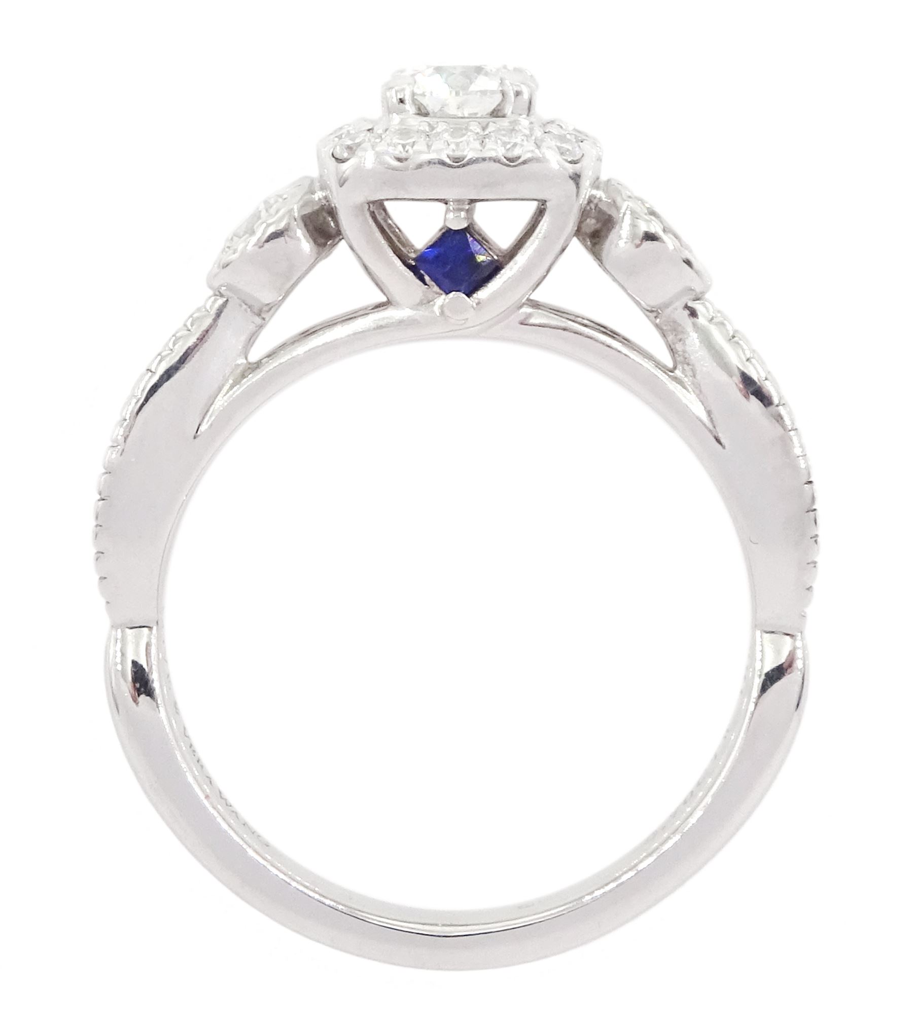 Vera Wang 18ct white gold diamond and sapphire 'Love' ring, round brilliant cut diamond cluster, with diamond set shoulders and sapphire set gallery, total diamond weight 0.70 carat, boxed