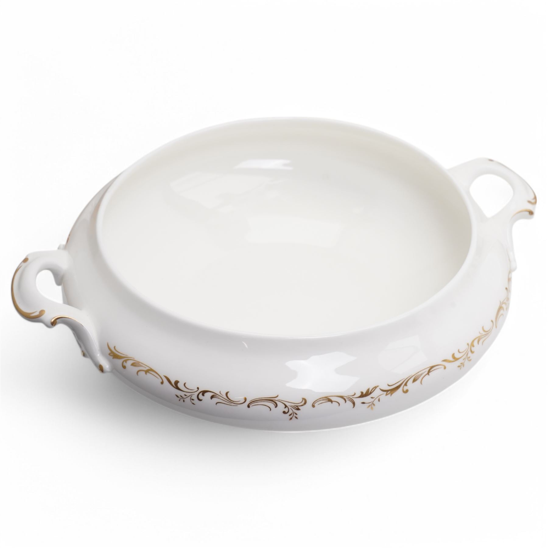 Royal Doulton dinner service in the 'Richelieu' pattern, comprising eleven dinner plates, twenty one dessert plates, twelve soup bowls, eleven dessert bowls, four vegetable dishes, oval serving dishes and graduating meat plates 