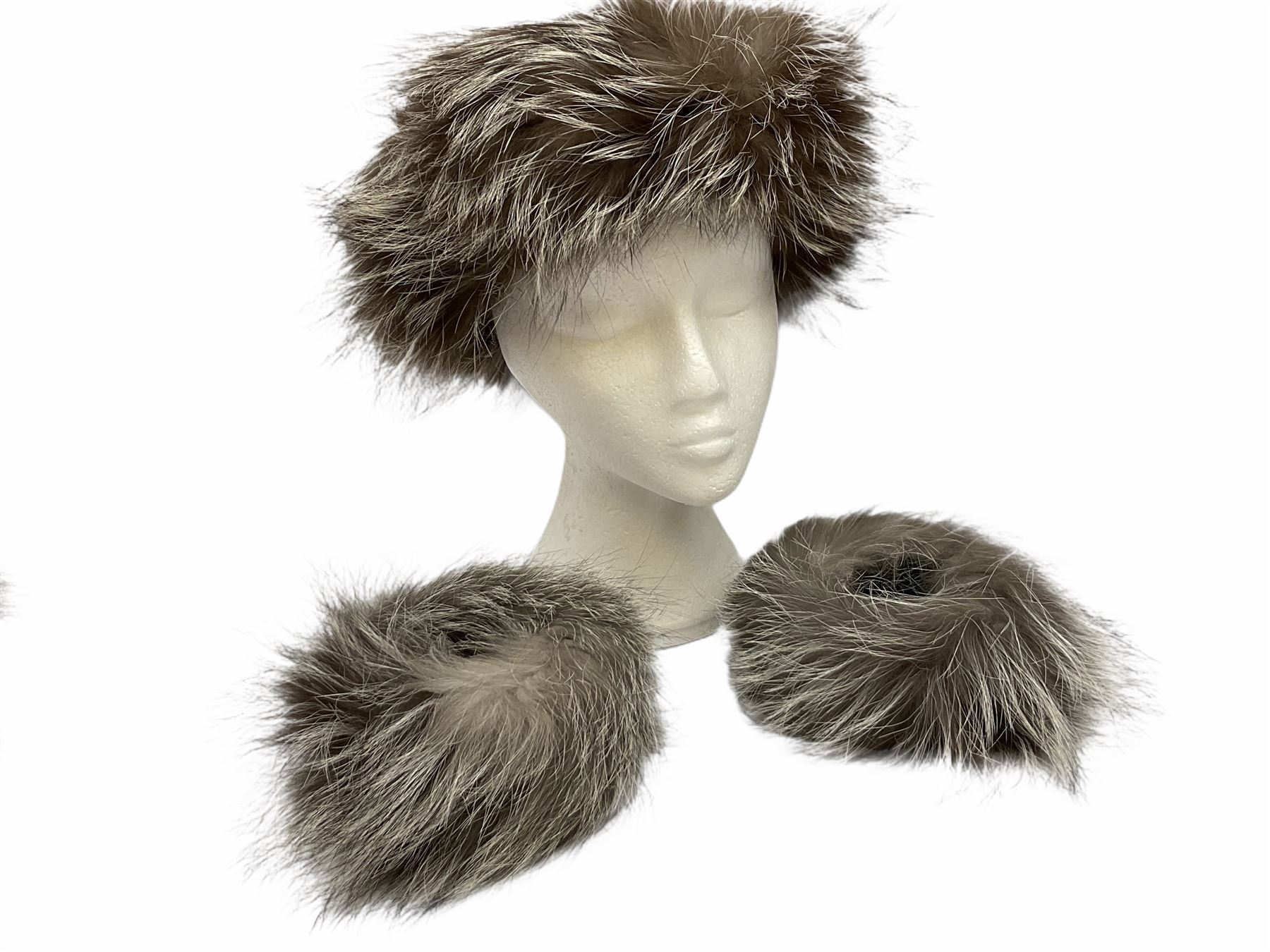 White Saga fox stole, together with Cresta Red fox fur hat, Red fox fur headband, a fur headband and matching cuffs, Harris Tweed clutch bag with fur trim, a fur clutch bag and an Ostrich feather and mohair scarf. 