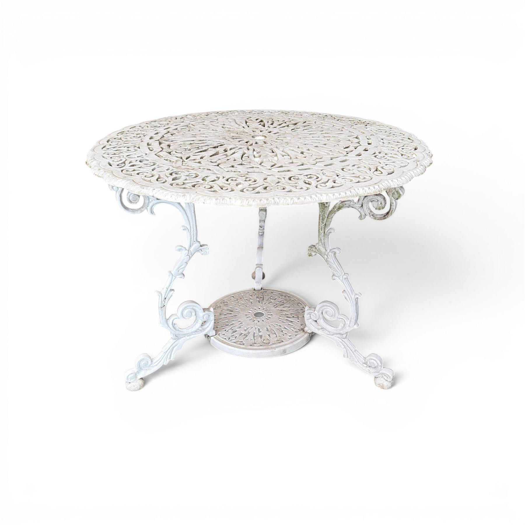 Victorian design cast aluminium circular garden table and four armchairs, ornate grape design in antique white paint