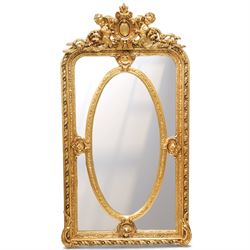 Regency style giltwood overmantel mirror, rectangular frame with swept corners enclosing a...