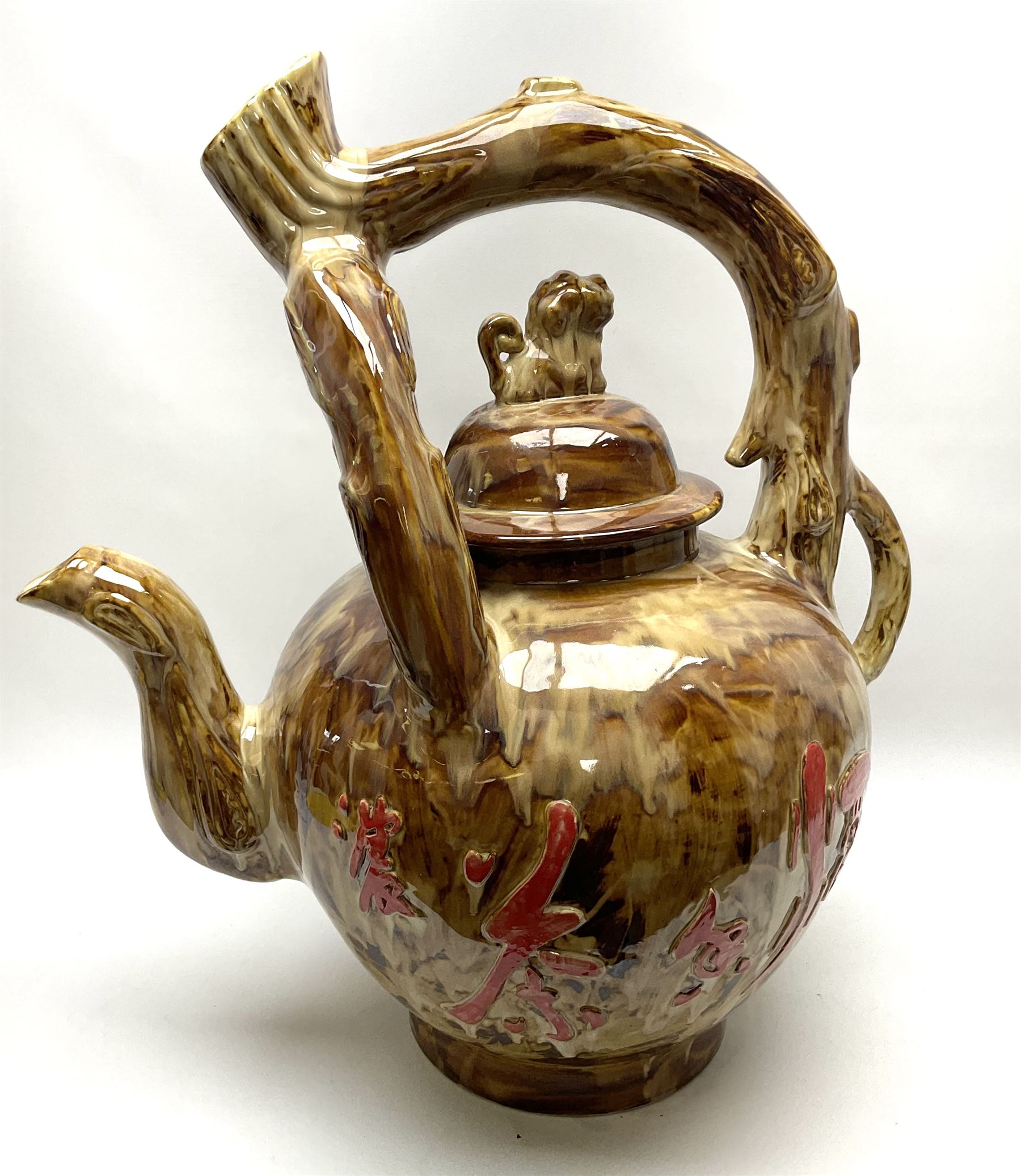 A large novelty Chinese ceramic teapot, the body decorated with