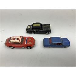 German Schuco Examico 4001 tin-plate clockwork model car with cream body work, steering wheel and gear stick; repainted Schuco die-cast BMW; three Minic Motorways cars; and three Scalextric Formula 1 racing cars; all unboxed (8)