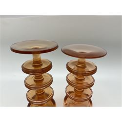 Five Wedgwood glass candle sticks by Ronald Stennet Willson, comprising two one ring examples and three, three ring example, largest H15cm