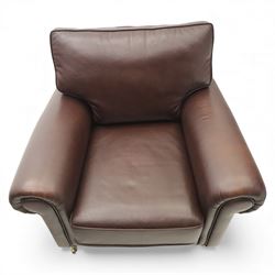 Laura Ashley - brown leather armchair and foot stool, loose cushion back and seat, flanked by scrolled arms upon light stained wood supports on castors, matching brown leather footstool with four panel top over light stained supports on castors (Footstool H 31cm, W 52cm)