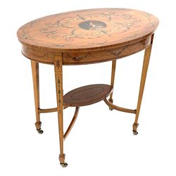 Edwardian Sheraton revival satinwood and painted centre table, oval top with hand painted portrait of woman wearing a hat, surrounded by scrolling leafage and floral garlands, square tapering supports terminating at spade feet with brass cups and castors joined by undertier