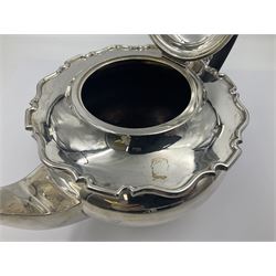 1920s five-piece silver tea service, comprising teapot, coffee pot, hot water pot, twin handled open sucrier and milk jug, each of squat circular form with shaped rim, the teapot, coffee pot and hot water pot each with ebonised handle and finial, the sucrier and milk jug with acanthus capped scroll handles, all upon circular foot, hallmarked R F Mosley & Co, Sheffield 1926 & 1927, tallest H24cm