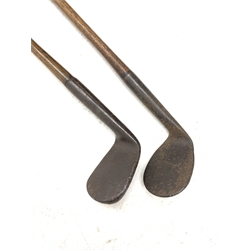 Golf - 19th century rut or track type iron with head indistinctly marked NIBLICK, hickory shaft marked Walter Hunter Golf Club Sutton Coldfield and suede leather grip, L96cm, together with another similar unmarked rut/track iron, (2)