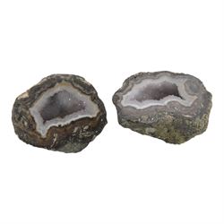 Collection of polished egg shaped mineral specimens, together with amethyst geodes and other minerals  