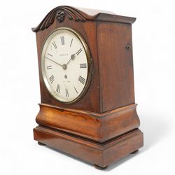 Brooks of London- Regency 8-day rosewood bracket clock c1825, with a serpentine shaped pediment and foliate carving on an ogee stepped base with bun feet, 8