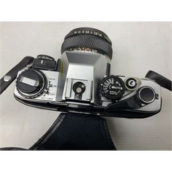 Olympus OM10 35mm camera, cased; pair of USSR 7 x 50 binoculars; cased; and pair of Le Jockey Club Paris binoculars