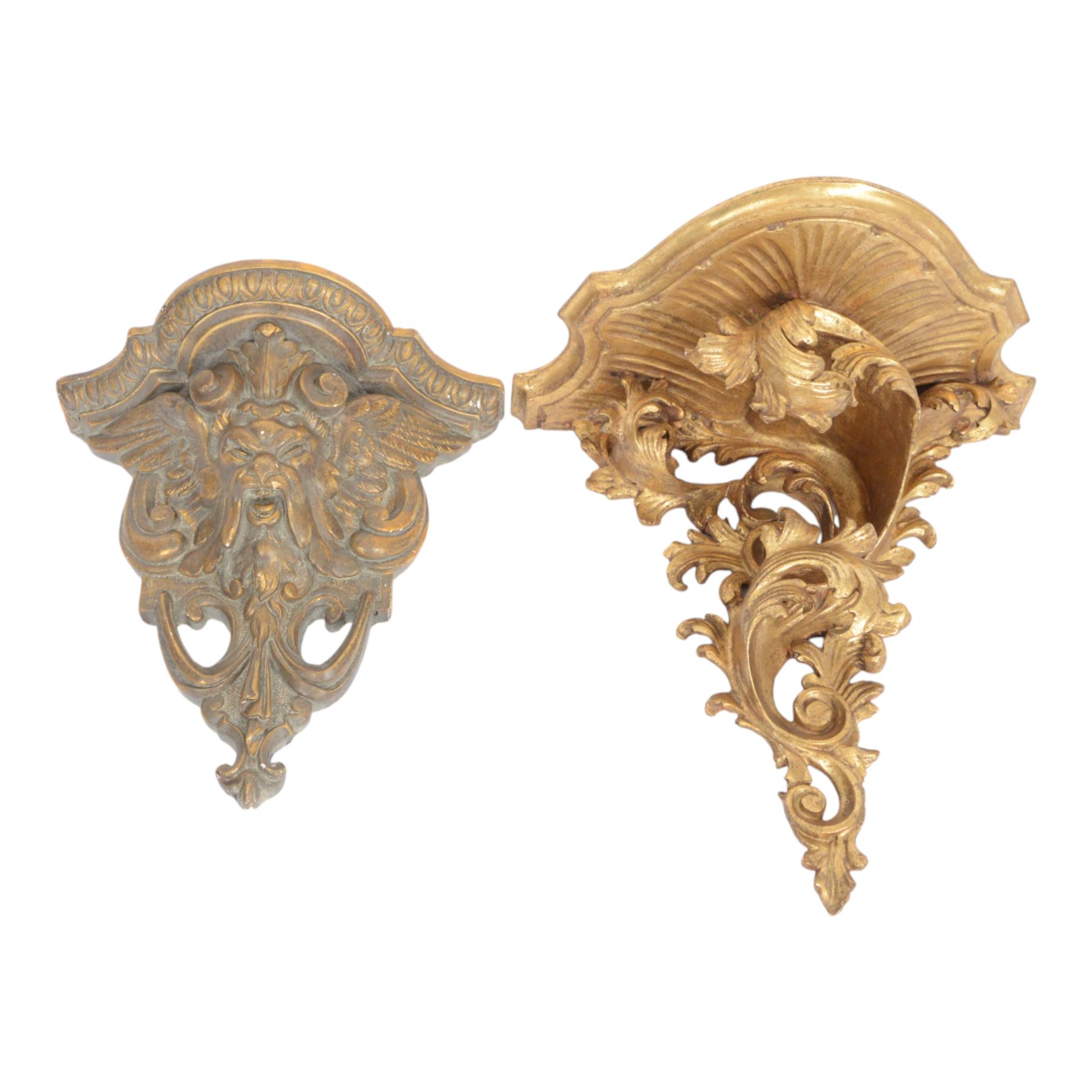 Two 20th century gilt wall brackets, comprising Rococo style carved wooden wall bracket upon a scrolling foliate support and a cast plaster bracket upon Griffin support, largest H38cm