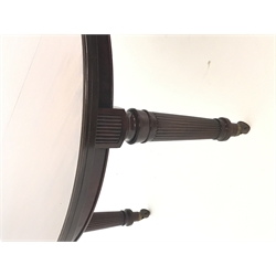 Spillman & Co. London - large Victorian mahogany extending dining table with three additional leaves, on turned and reeded supports with ceramic castors, ivorine label to underneath 'Spillman & Co. St. Martins Lane, London', diameter - 137cm (closed), L302cm (with all leaves)