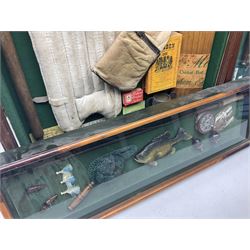 Four framed sporting memorabilia displays, the largest example containing 1930s cricket memorabilia, together with two fishing displays and a football display, each within wooden glazed frames, largest H105cm