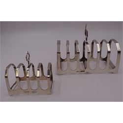 1930s silver seven bar toast rack, with angular bars and loop handle, together with a similar smaller five bar toast rack, both hallmarked Sydney Hall & Co, Sheffield 1933, tallest H10.5cm