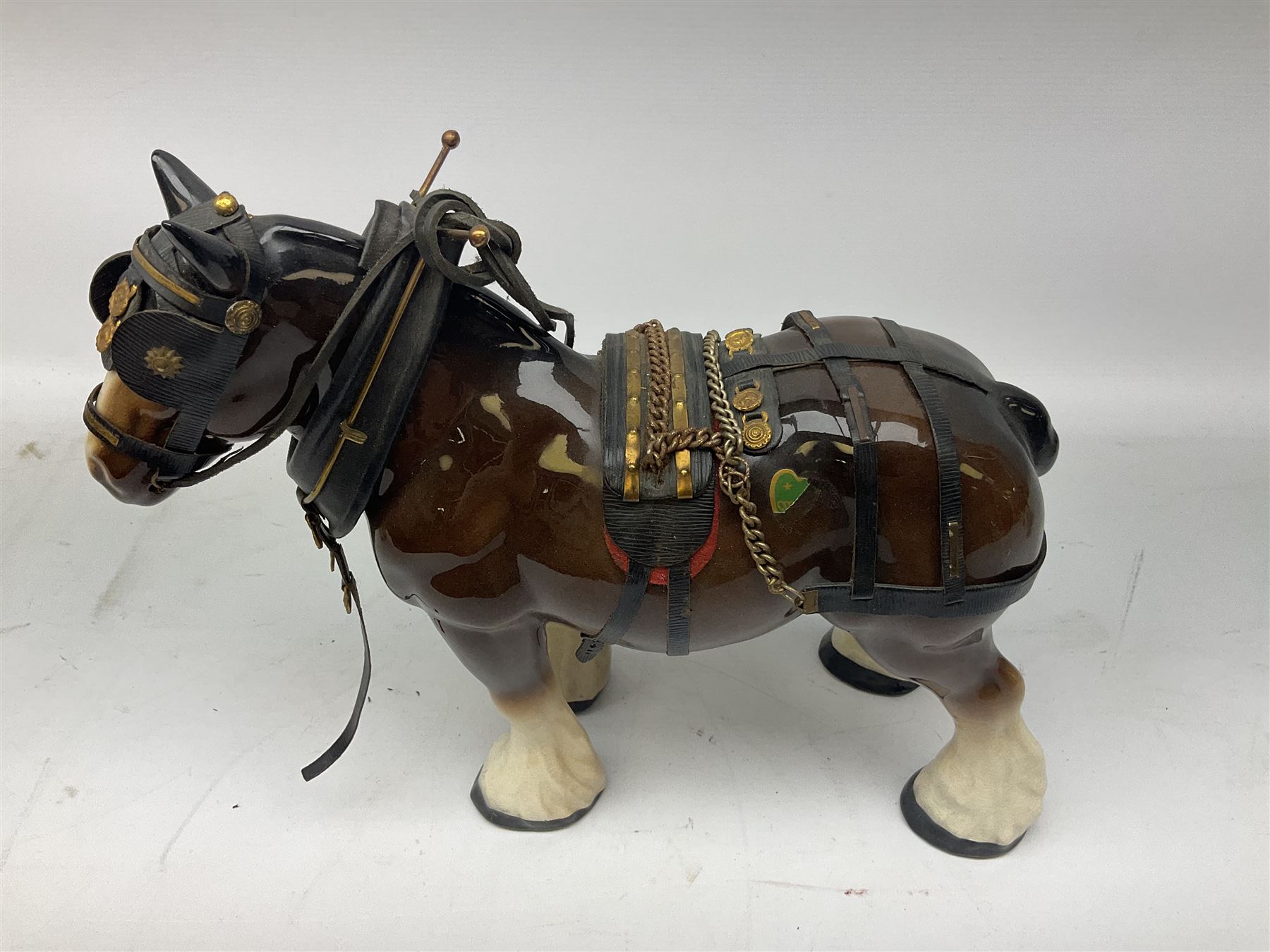 Four Melba Ware Shire horse figures and another similar, and three wood carts