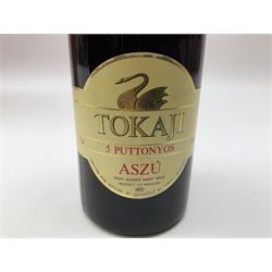 Presentation set comprising Hine Antique cognac 70cl, 40% volume and four miniature bottles of Hine cognac, 1957, 1960, two 1982, all 5cl, 40%   together with bottle of Tokaji sweet wine, 500ml, 13%