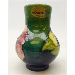  Moorcroft 'Hibiscus' pattern vase on green ground, H13.5cm  